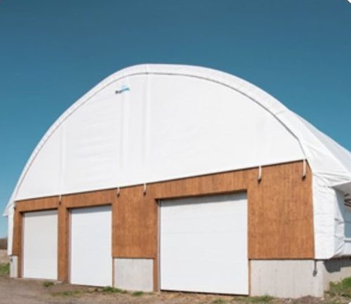 Fabric building multiple garage bay doors for fleet access